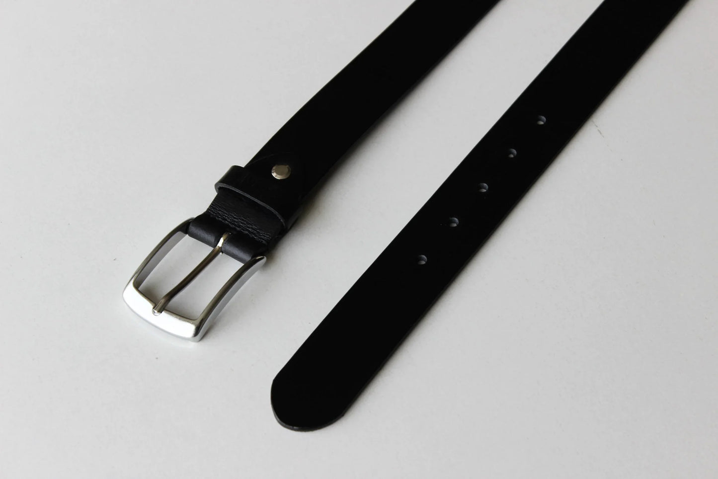 Black Leather Belt with Sleek Silver Buckle